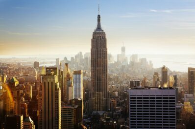 Aerial view of the Empire State Building and NYC skyline.